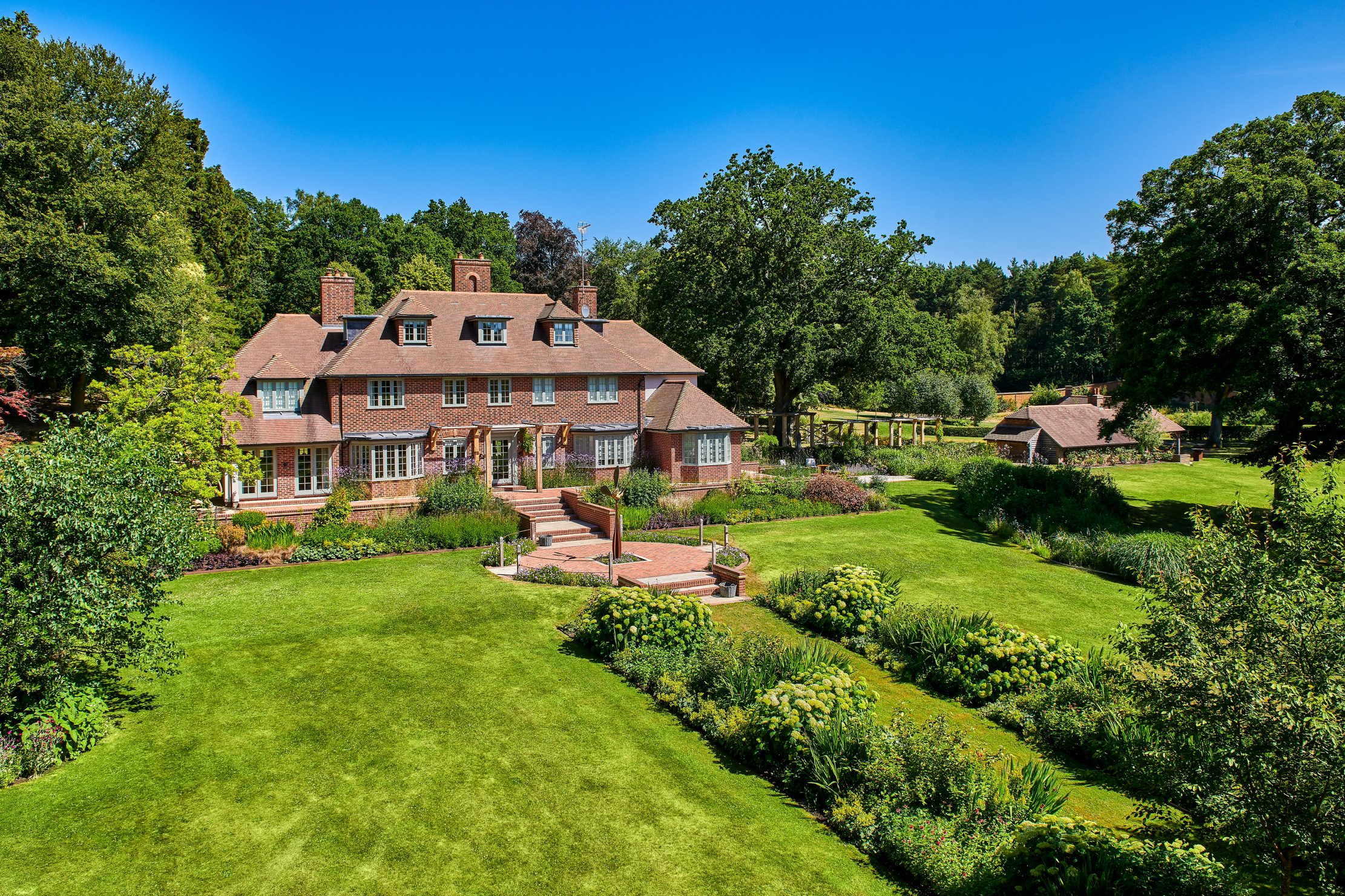 An Eight-Bedroom Home In Surrey Where An Army Of Robots Will Look After Your Lawns